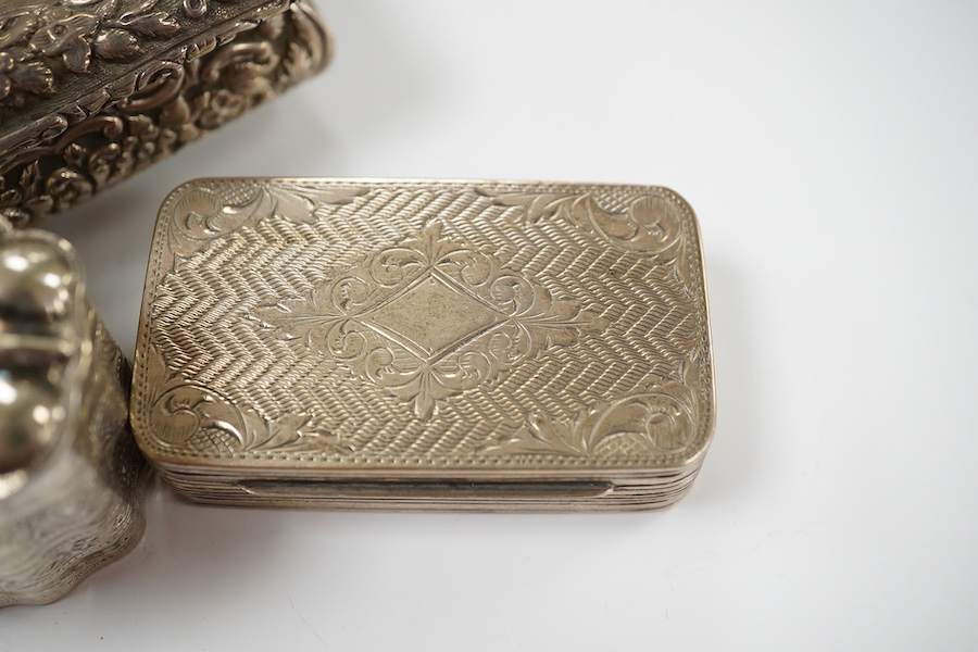 A George IV silver snuff box, by Nathaniel Mills (a.f.), Birmingham, 1827, 84mm, a Dutch white metal pill box and a Portuguese white metal snuff box. Condition - poor to fair